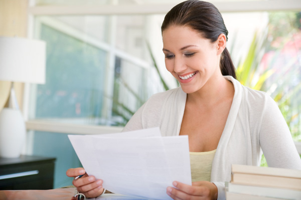 woman-looking-over-financial-papers.jpg